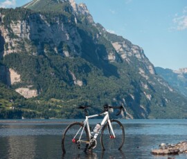 a bicycle parked on a beach